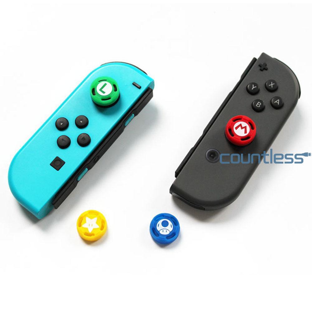 Bộ 4 Nút Silicone Thay Thế Cho Tay Cầm Chơi Game Nintendo Switch Ns