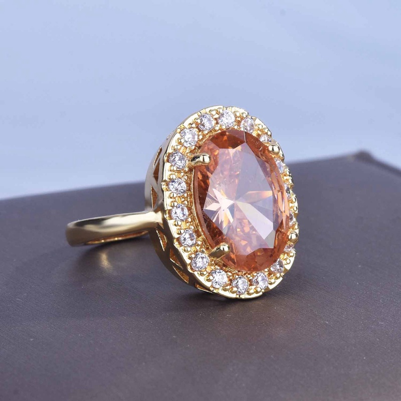 Nhẫn đính hôn đính đá zircon hình oval lớn màu vàng đồng phong cách vintage sang trọng cho nữ