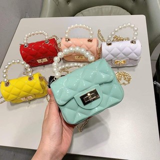Túi xách mini quai ngọc cho bé