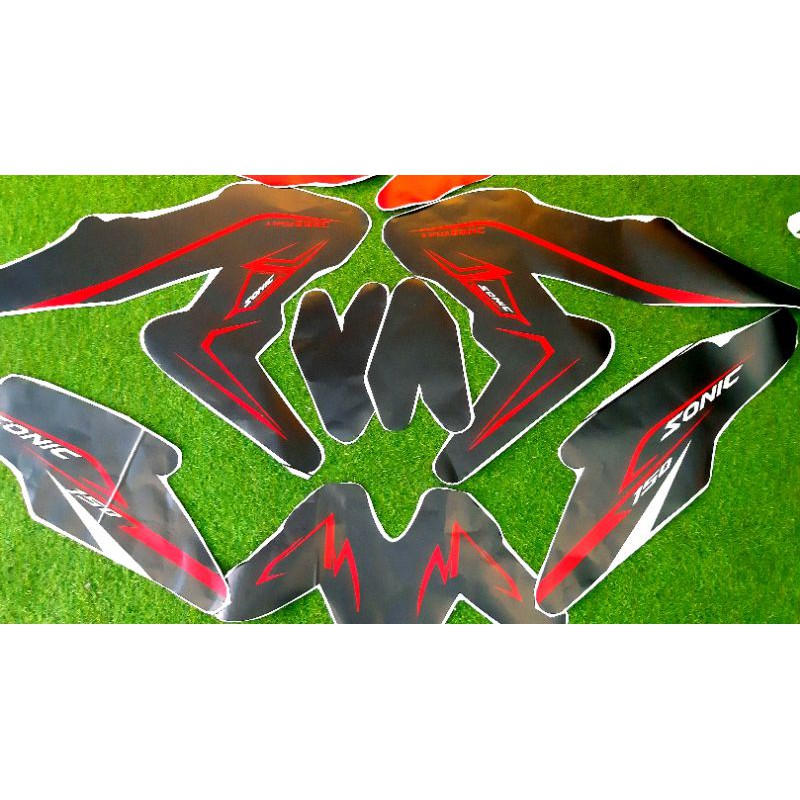 TEM TRÙM SONIC ĐEN NHÁM CHỈ ĐỎ