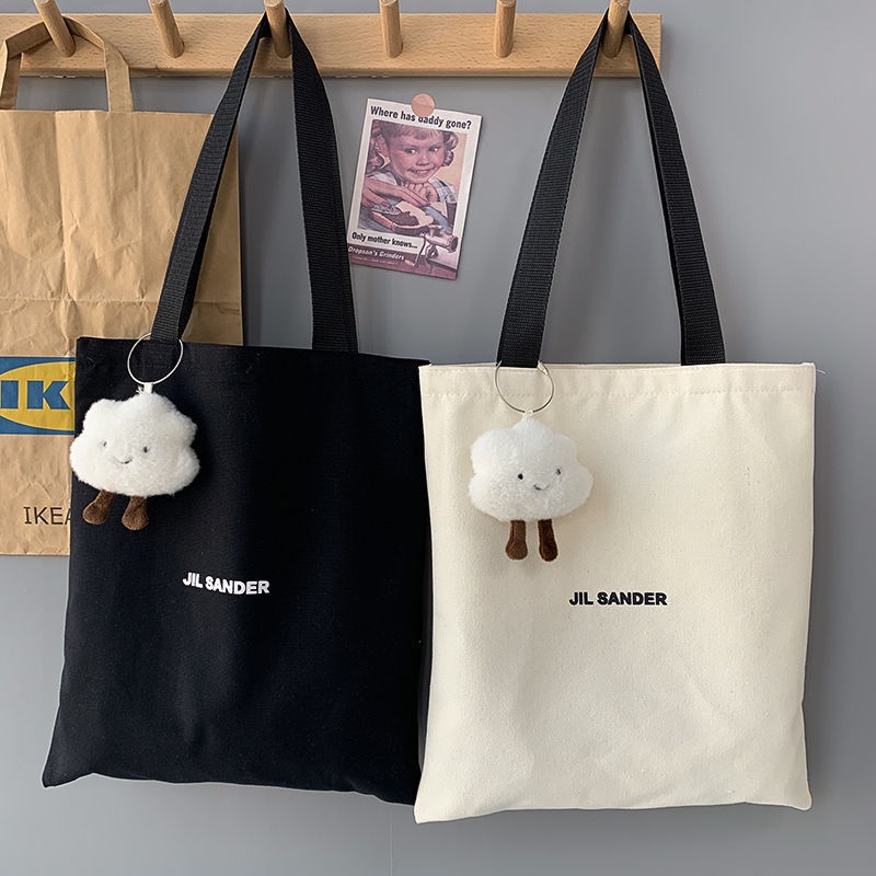 1 Ba Lô Vải canvas Màu Trắng Đen Đơn Giản
