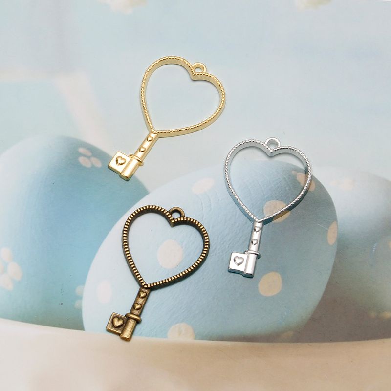 Bộ 10 Khung Kim Loại Hình Trái Tim / Chìa Khóa / Hoa UV Resin Làm Vòng Tay / Vòng cổ Thủ Công DIY