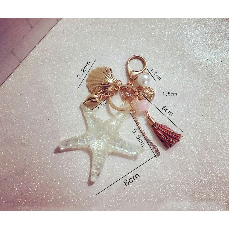 MÓC KHÓA SAO BIỂN DẠ QUANG