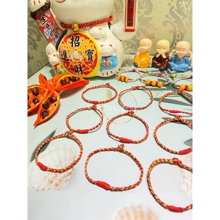 vòng tay chỉ đỏ may mắn