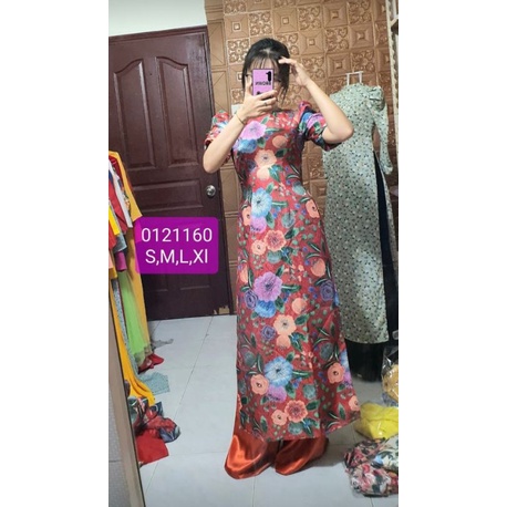 Áo dài gấm nỗi hoa