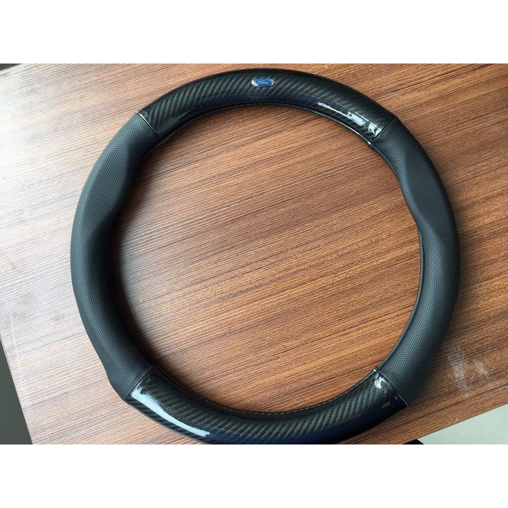 Bọc vô lăng xe ford everest focus ranger ecosport fiesta explorer transit escape chất liệu da vân cacbon