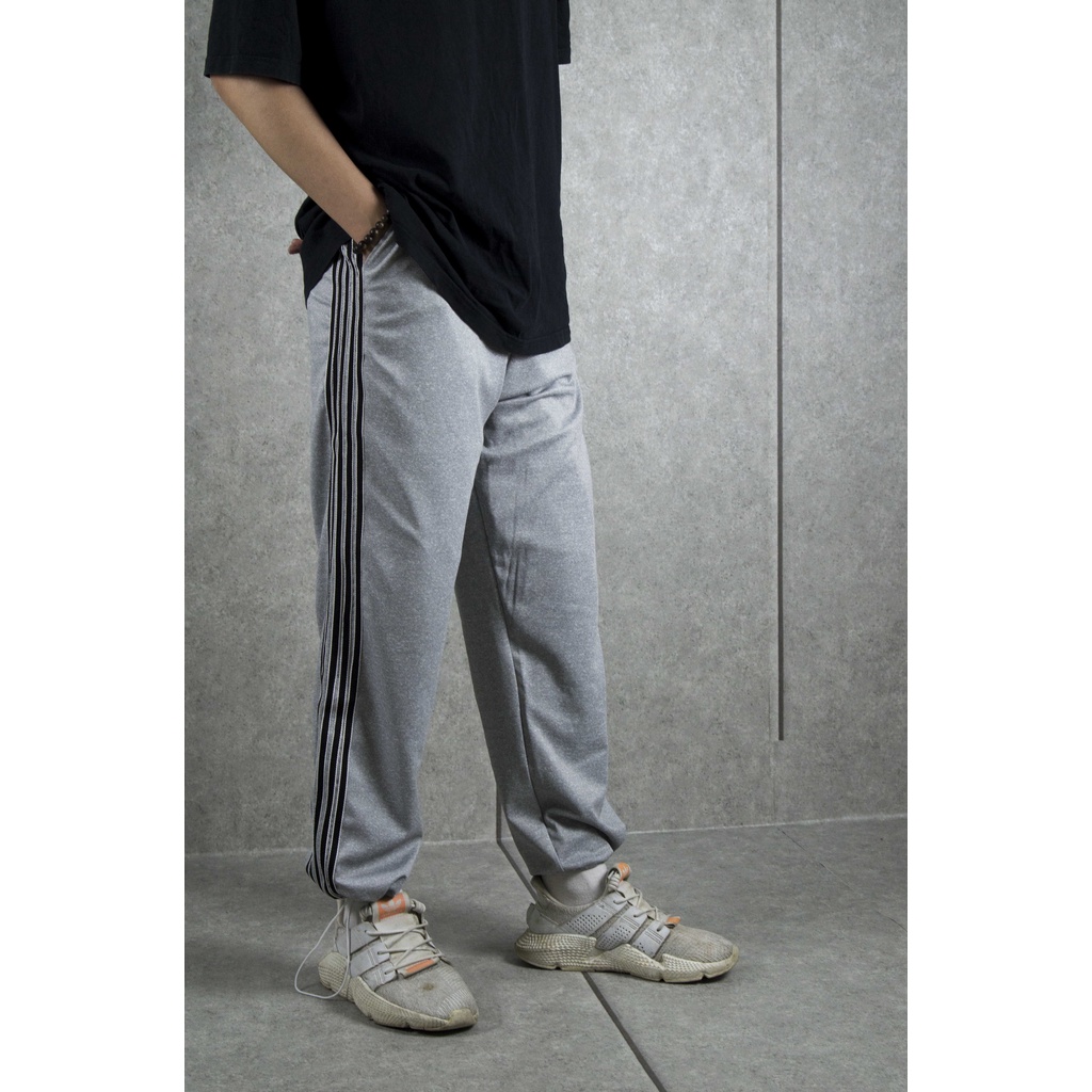 Quần Jogger Đa Năng Nam Nữ Basic Pants Ulzzang Form Suông 5 Sọc Thể Thao Có Thể Để Suông Hoặc Bo Gấu J4U