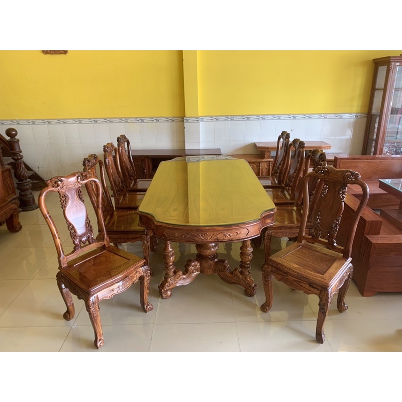 Bộ bàn ăn cẩm lai xịn sơn ta 8 ghế chạm đào tựa bình bàn ovan khuyết Mã BBA4258C