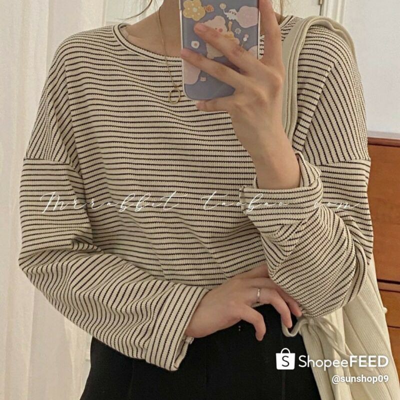 Áo len kẻ gân sóng