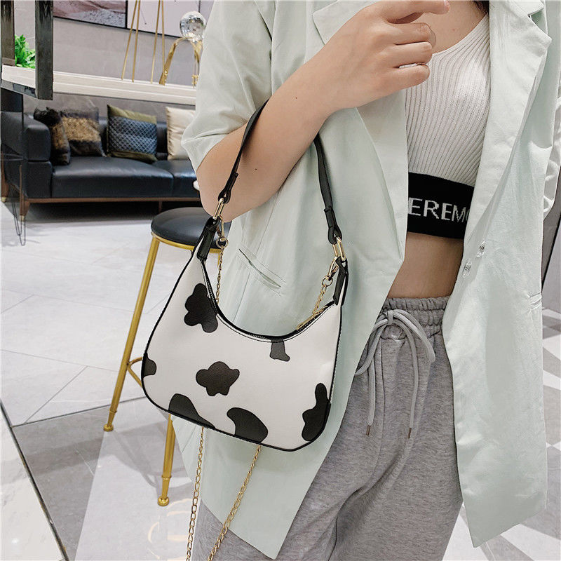 Túi xách đeo vai họa tiết da bò sữa thiết kế thời trang cho nữ