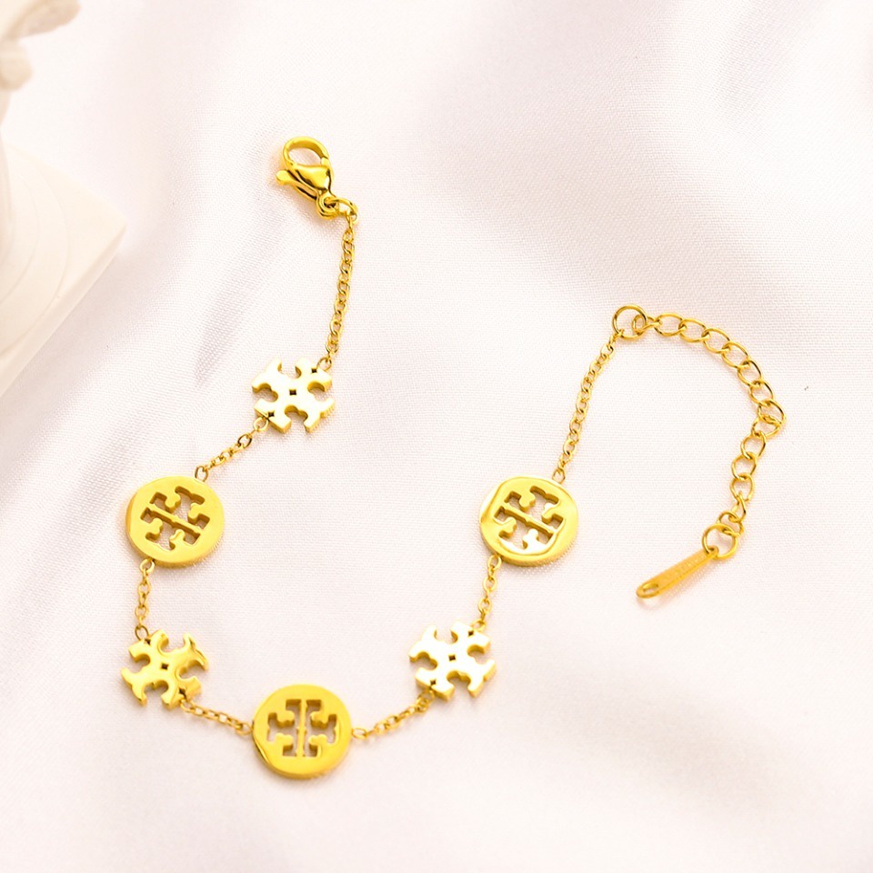 Vòng Đeo Tay Bằng Thép Titan In Chữ Tory Burch Tinh Tế