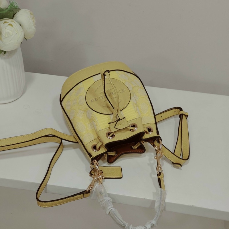 Túi Coach bucket rút miệng mini - nhiều màu sale xả