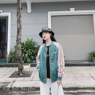 Áo bomber màu xanh lá lạ