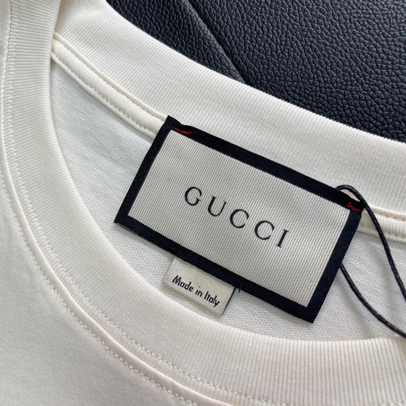 Áo Tee Gu*cci 100 Music Is Mine Màu Off-White