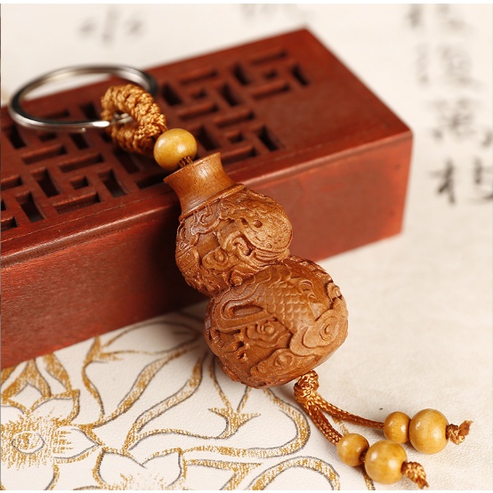 Móc khóa hình trái bầu bàng gỗ xịn đẹp chống nước - moc khoa xe