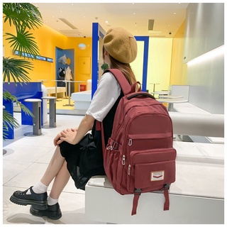 【FANTO】Middle school student schoolbag girl simple and versatile high school student computer backpack large capacity travel leisure backpack