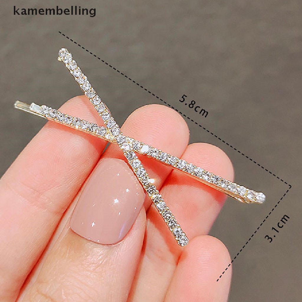Set 2 kẹp tóc chữ X đính đá pha lê đơn giản