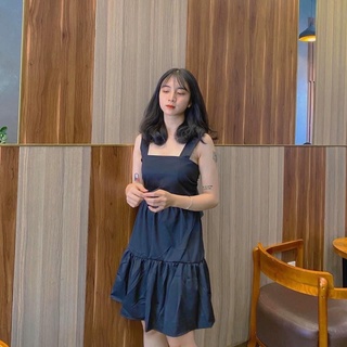 Đầm hai dây cột nơ lưng màu đen chất vải lụa dày dặn thiết kế xoè nhẹ với tầng bèo phồng