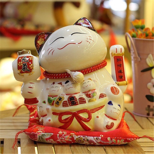 Mèo thần tài vẫy tay dùng được với pin cao 18cm dòng hộp tím