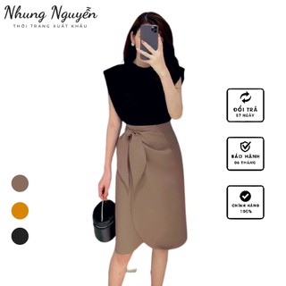 Chân váy bút chì công sở dài qua gối, thắt nơ bên hông trẻ trung, dễ phối đồ