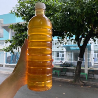Mật ong nguyên chất hoa cả kim Đak Lak chai 1 lít