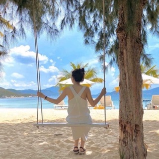 Váy maxi đũi nhăn đan chéo lưng màu trắng dáng dài