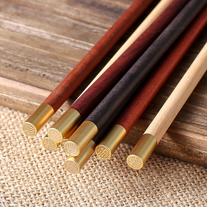 DĐầu kim loại gia dụng cao cấp Đũa gỗ đàn hương đỏ phủ số lượng lớn