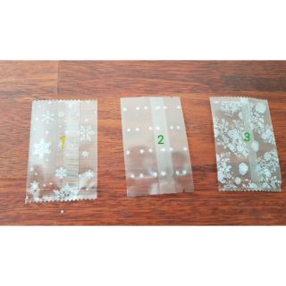Bịch 100 túi đựng bánh kẹo  hình bông tuyết size 7x10cm
