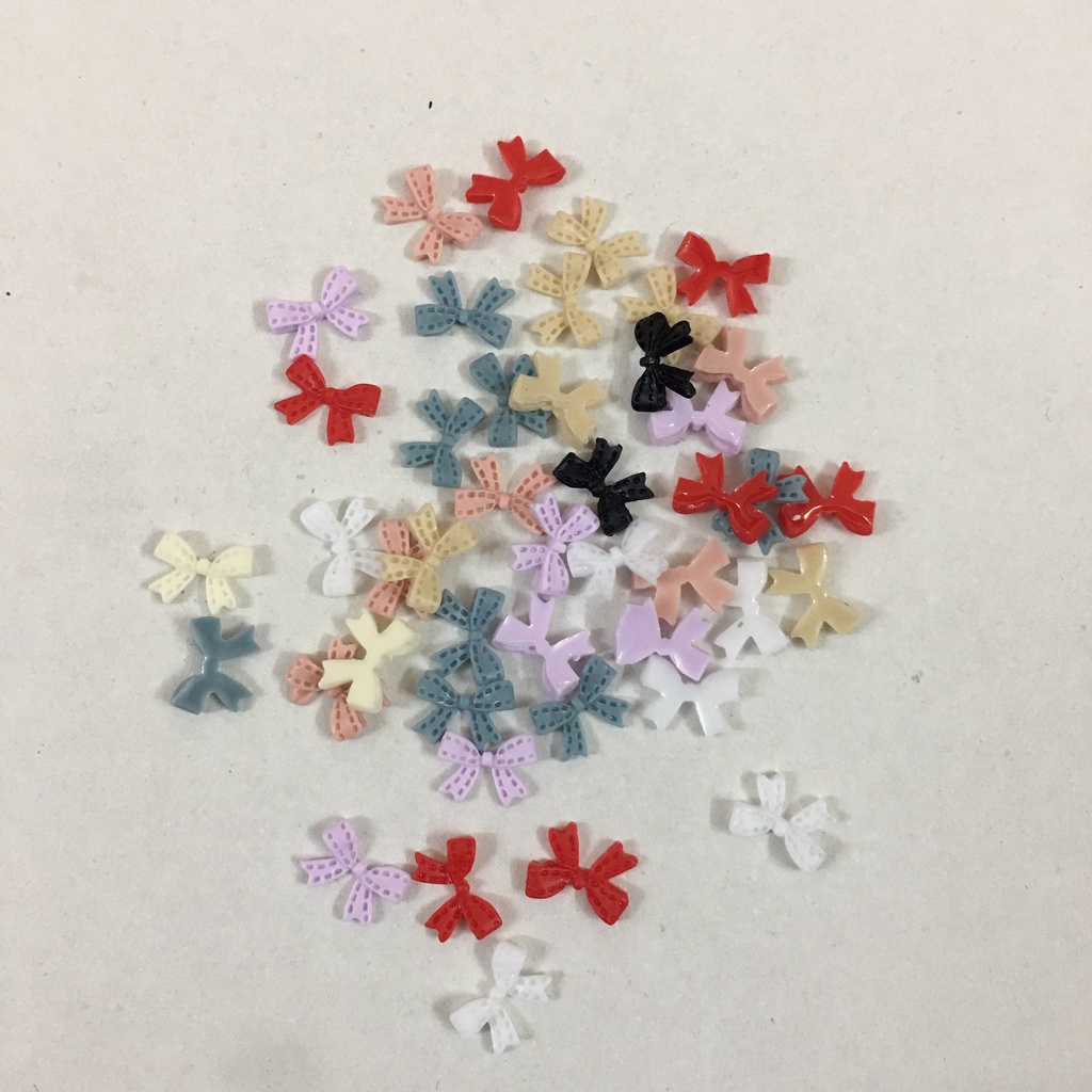 Set charm nơ xinh làm nail