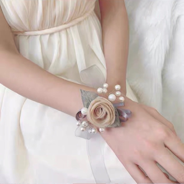 Hoa đeo tay thắt nơ cô dâu, phù dâu