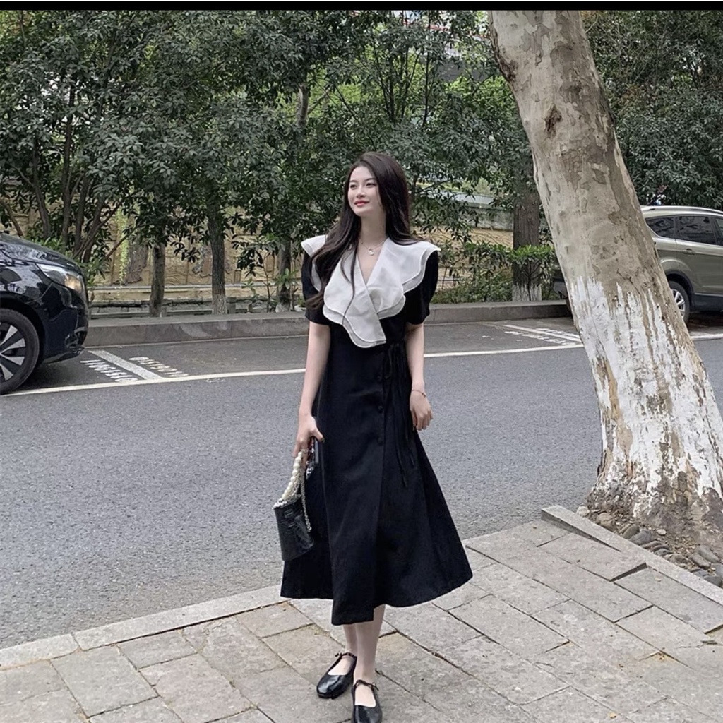 Váy phối cổ V ,đâm tơ hai lớp vạt cúc bọc,chất vải mango co giãn nhẹ,cúc bọc tỉ mỉ thủ công lên đồ chanh xả-Minxy shop