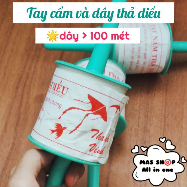 Tay cầm và dây nhợ thả diều, hơn 100 mét