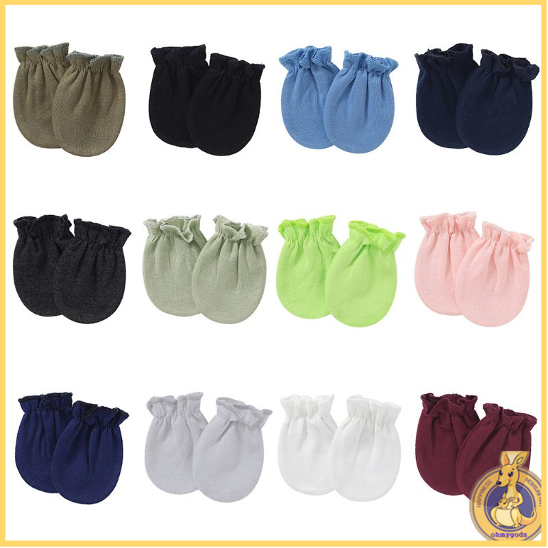 Cặp găng tay cotton mềm màu trơn chống trầy xước cho trẻ sơ sinh