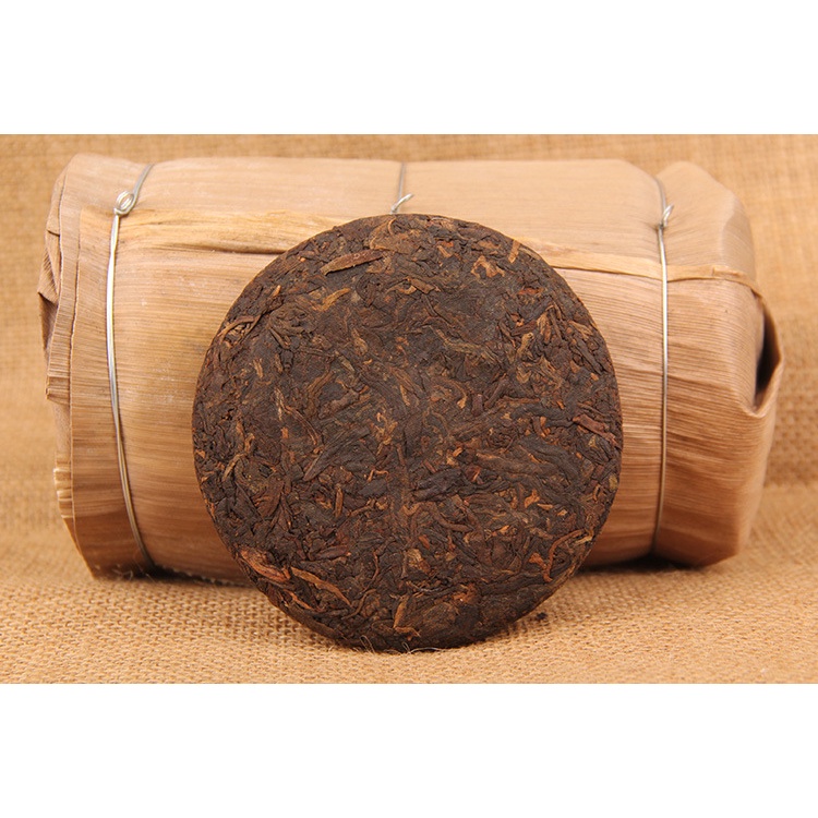 BÁNH TRÀ PHỔ NHĨ CHÍN VÂN NAM LÃO BAN CHƯƠNG THƯỢNG HẠNG 09 NĂM TUỔI 100 GRAM (NĂM SẢN XUẤT 2013)