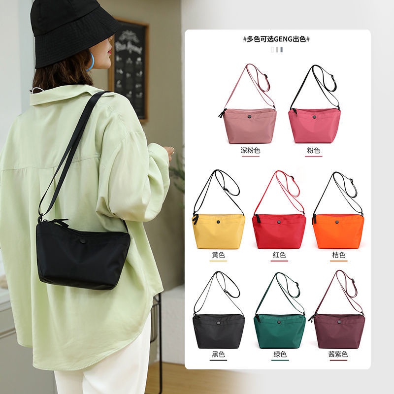 Túi Đeo Chéo Vai Hình Bánh Bao Thời Trang Bằng Vải Canvas Phối Nylon Phong Cách Thể Thao Hợp Xu Hướng Dành Cho Bạn Nữ