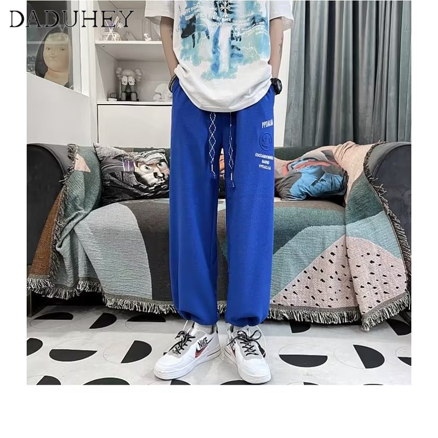 Quần nỉ thể thao dáng rộng ống rút dễ phối đồ thời trang mùa xuân phong cách đường phố Hồng Kông cho nam