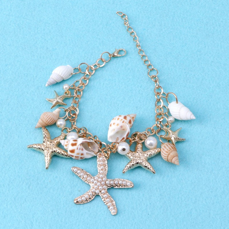 Vòng tay hoạ tiết vỏ sò đính hạt giả ngọc trai