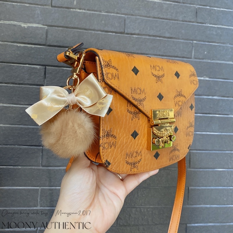 Charm Bông mix nơ hãng MCM auth