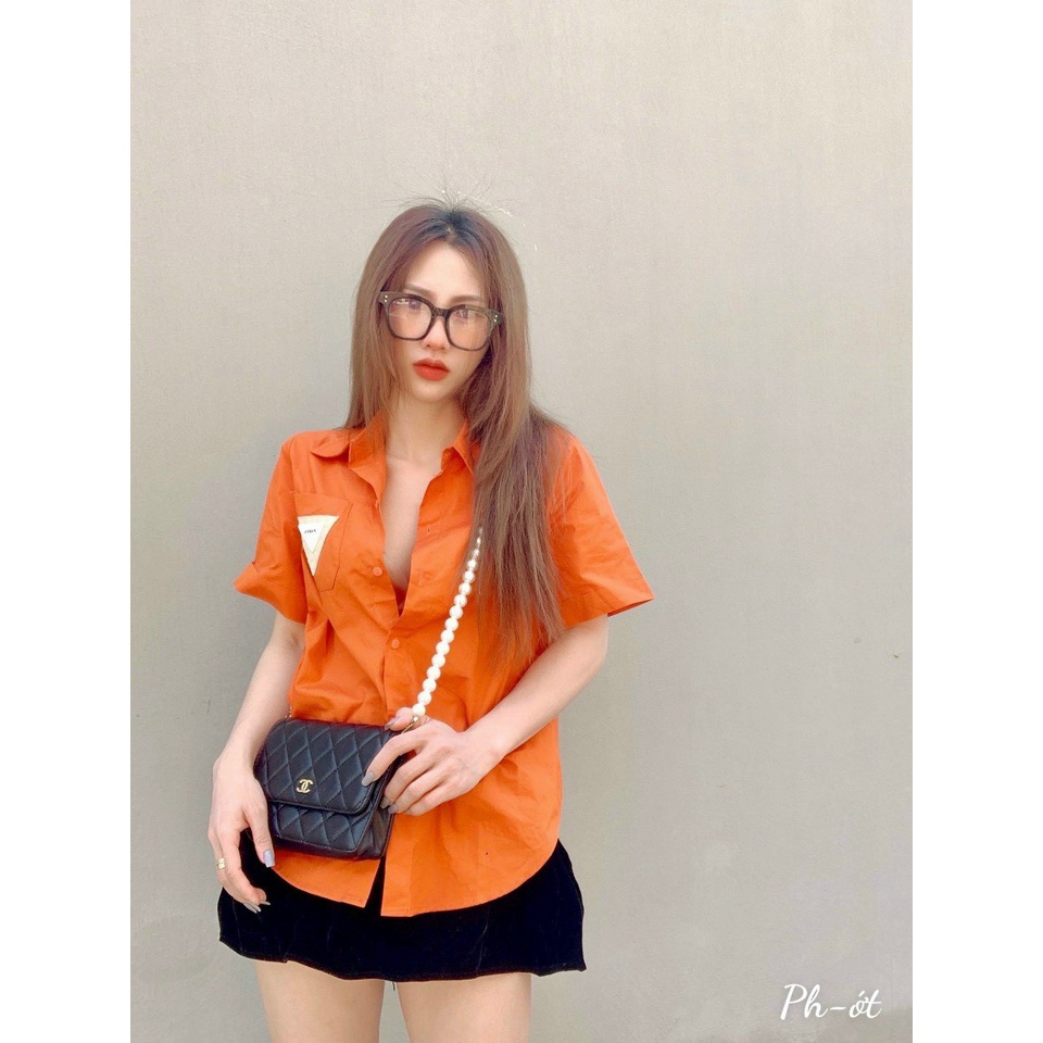 Áo sơ mi nữ trắng cộc tay in túi PRA