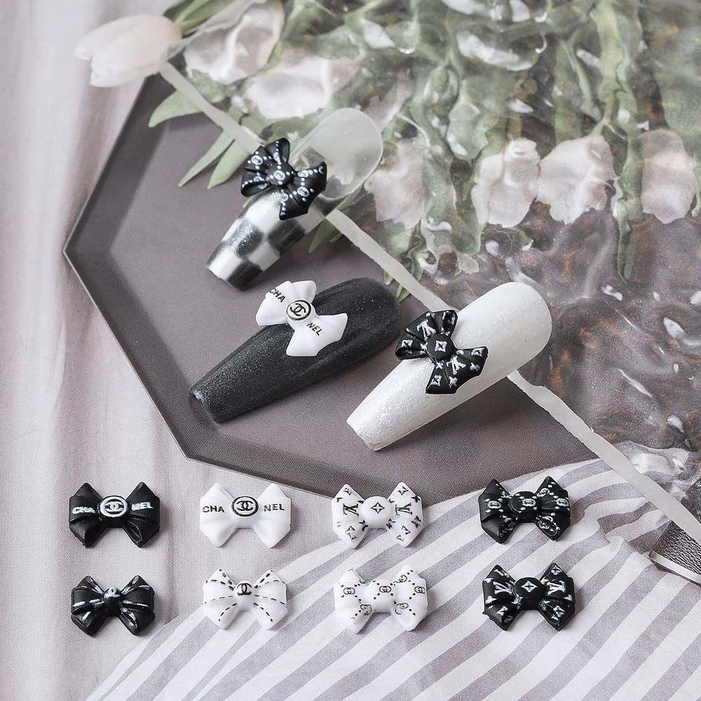 Phụ Kiện Trang Trí Móng Tay Hình Nơ 3D Bằng Nhựa Resin Màu Trắng Đen Thanh Lịch