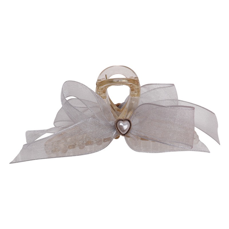 Dây buộc tóc đính ngọc trai và tua rua