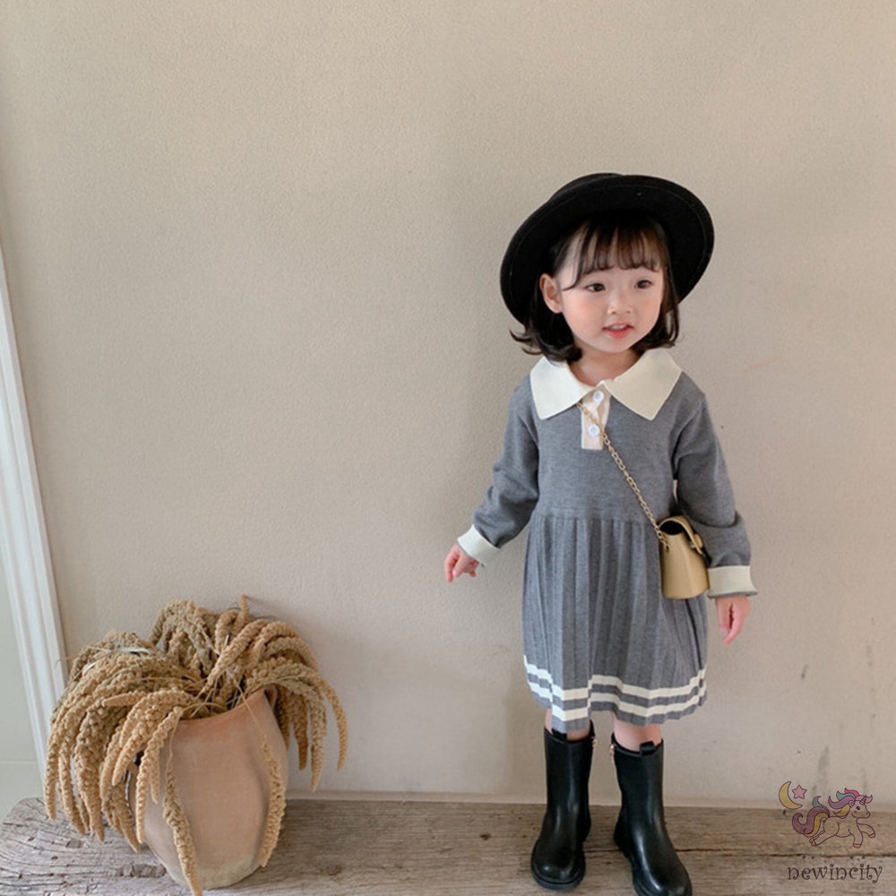 Đầm dài tay phối bèo nhún cho bé