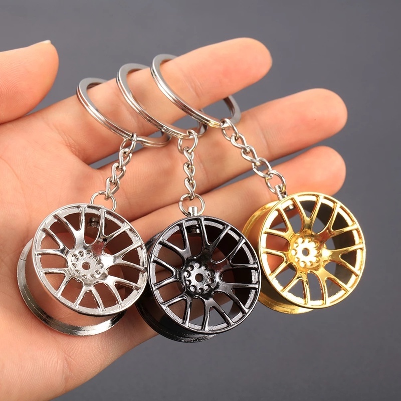Móc khóa kim loại màu đen mini giảm xóc cho xe hơi
