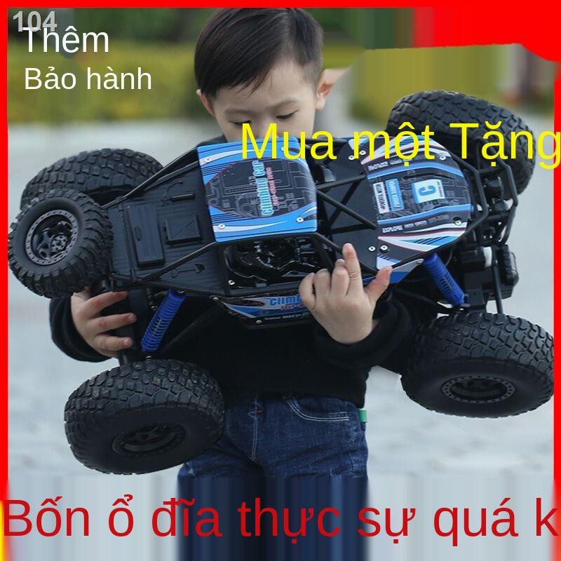 AĐồ chơi ô tô điều khiển từ xa sạc xe địa hình drift xe đua Xe leo núi tốc độ cao có đèn pha và chống ngã Đồ chơi cậu bé