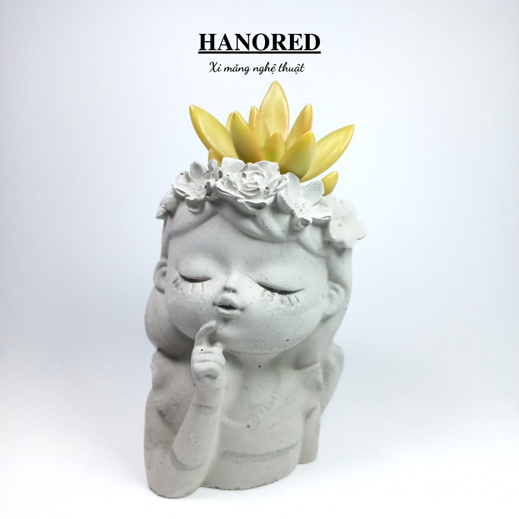 Chậu xi măng mini hình em bé đội hoa &quot;uhm&quot;  HANORED trồng sen đá, xương rồng, tô tượng kích thước 11×7×7 (cm)