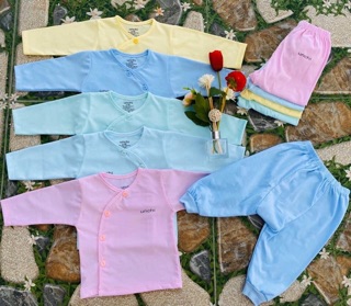 Bộ sơ sinh cúc lệch Unchi vải cotton.