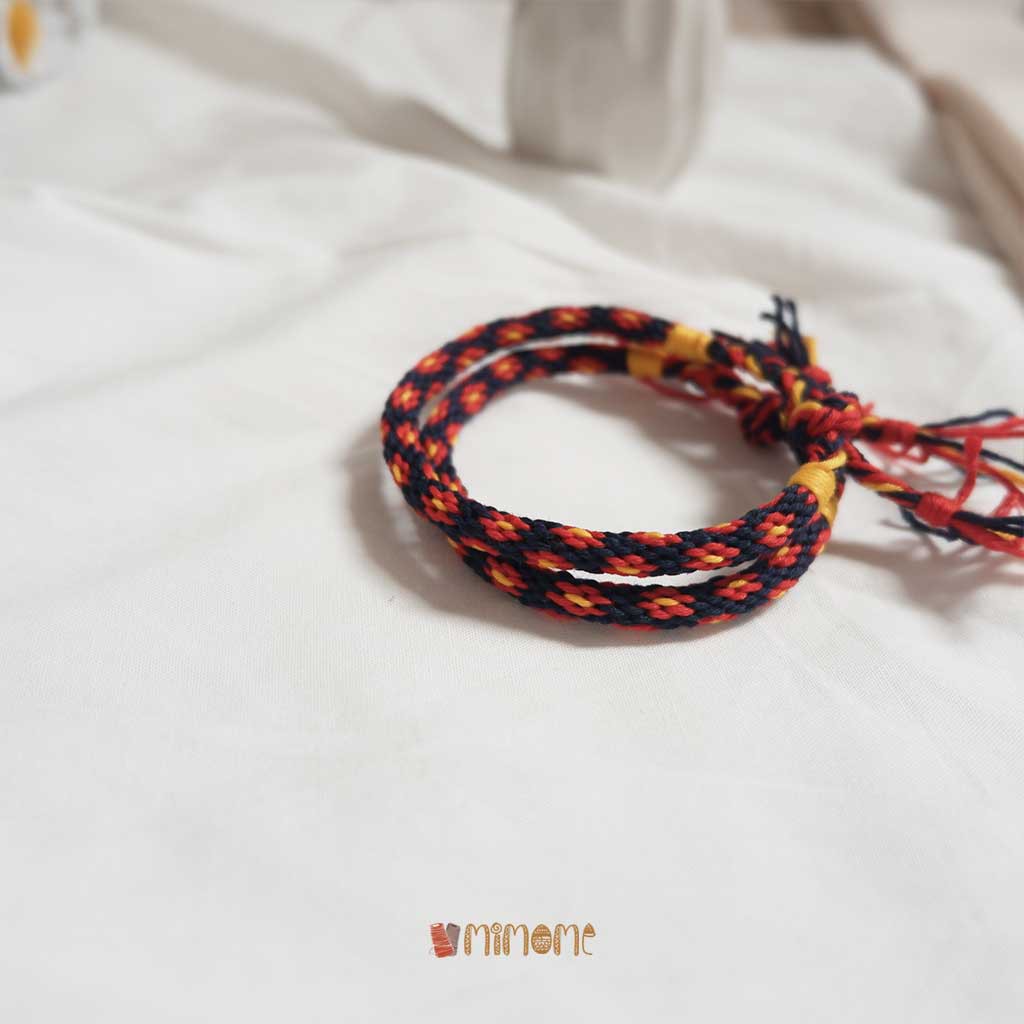 Vòng kumi navy hoa đỏ