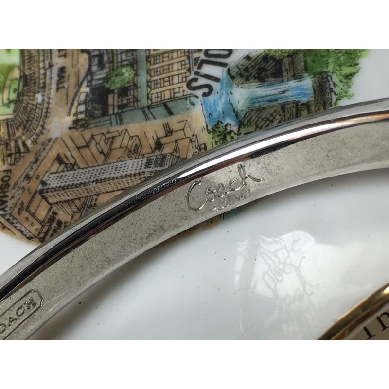 Vòng tay vintage Coach- màu hồng cánh sen đính viên bi