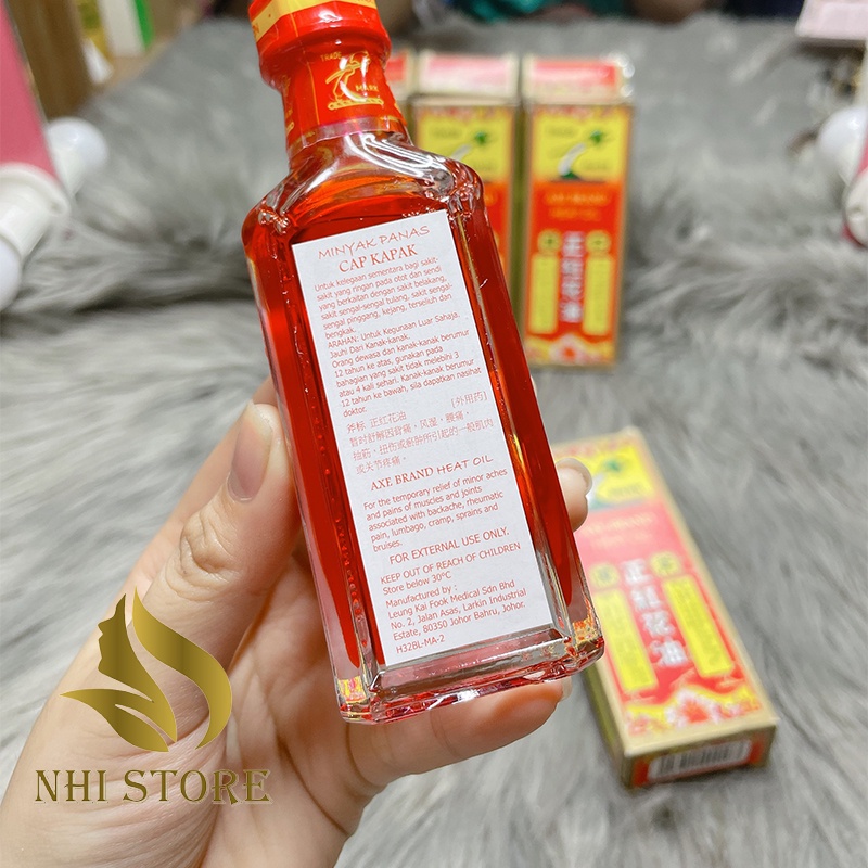 Dầu gió Hồng Hoa hiệu cây búa , đau nhức cơ , bong gân , thấp khớp , bầm tím , massage body singapore 32ml