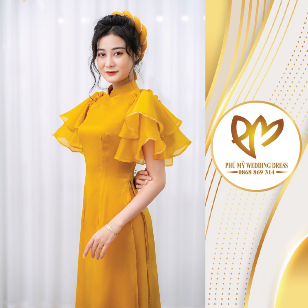 Áo dài von tơ tay cánh tiên vàng điệu đà cho nàng